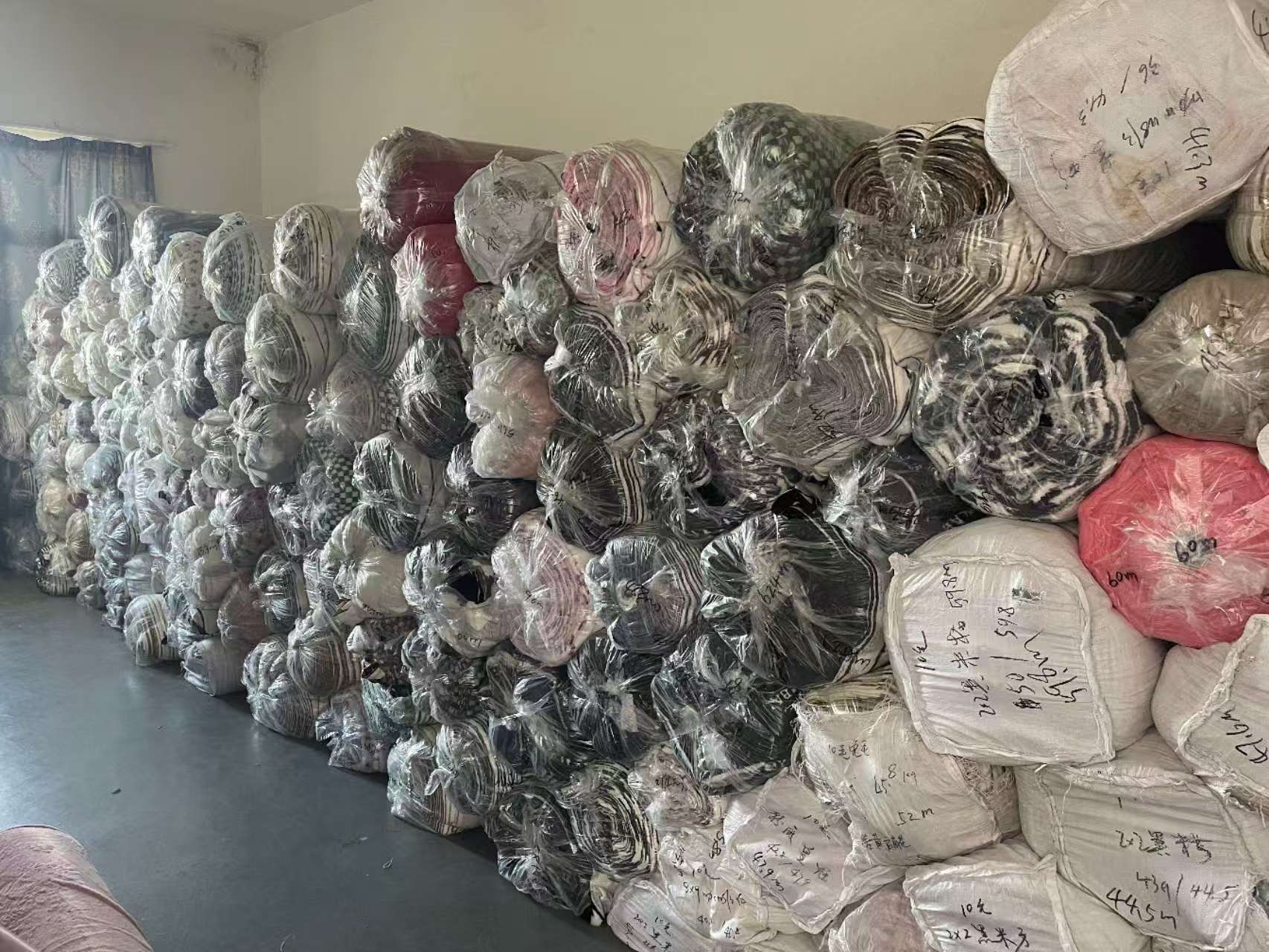 Packed fabric stock lots in the Ningbo warehouse